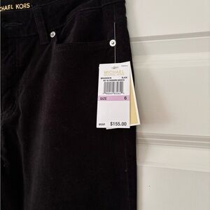 Michael Kors Black Fine corduroy flare bottom leg mid rise. Brand new with tags